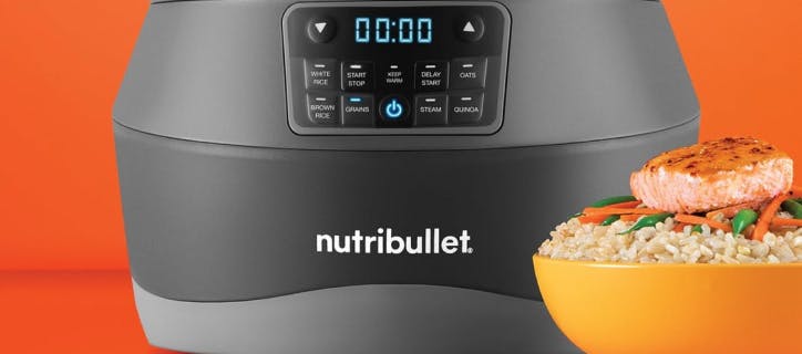 nutribullet® EveryGrain Cooker next to a bowl filled with rice, veggies, and fish on an orange background