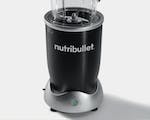 Product preview 6 of 6. Thumbnail nutribullet motor base and extractor blade on grey background.